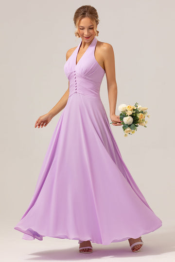 Un vestido de dama de honor morado largo de gasa halter sin espalda